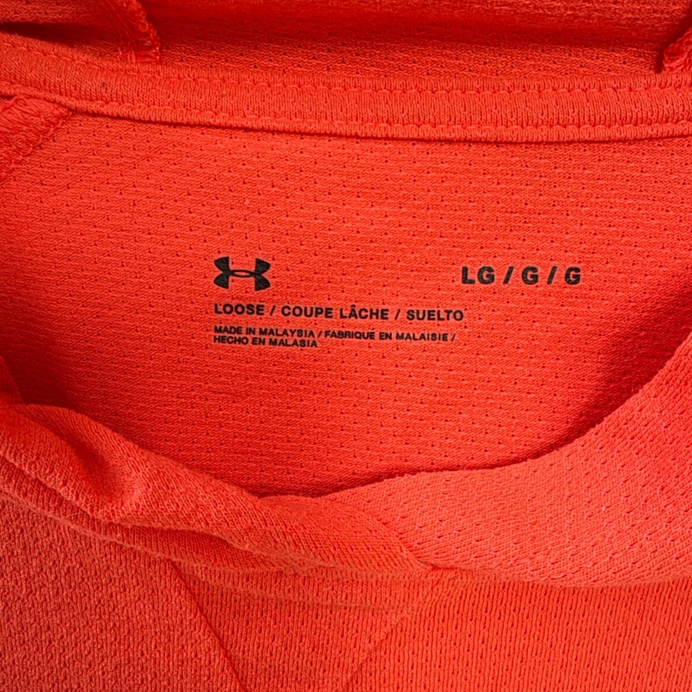 Under Armour Women's Pindot Hoodie-Graphic in a vibrant orange or coral color. - Picture 5 of 5